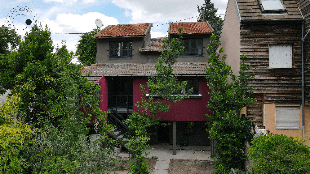 Façade sur cours du projet de réhabilitation d'une maison de ville à Gentilly